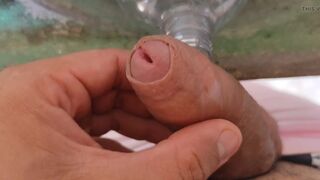 Malleable stick in the disinfectant bottle of the inexperienced straight slave.