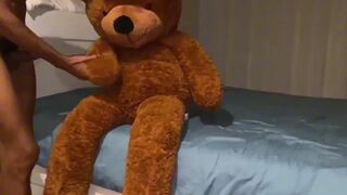Watch Asafe Santtos take a huge bareback cock in her teddy bear and get milked - 1 image