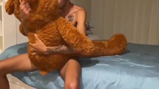 Watch Asafe Santtos take a huge bareback cock in her teddy bear and get milked - 2 image
