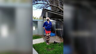 Daisy taped to a pole in back yard - 10 image